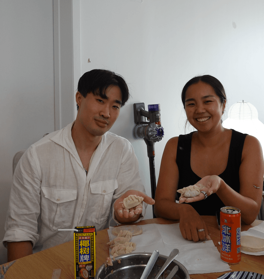 Guests showing the dumplings they made